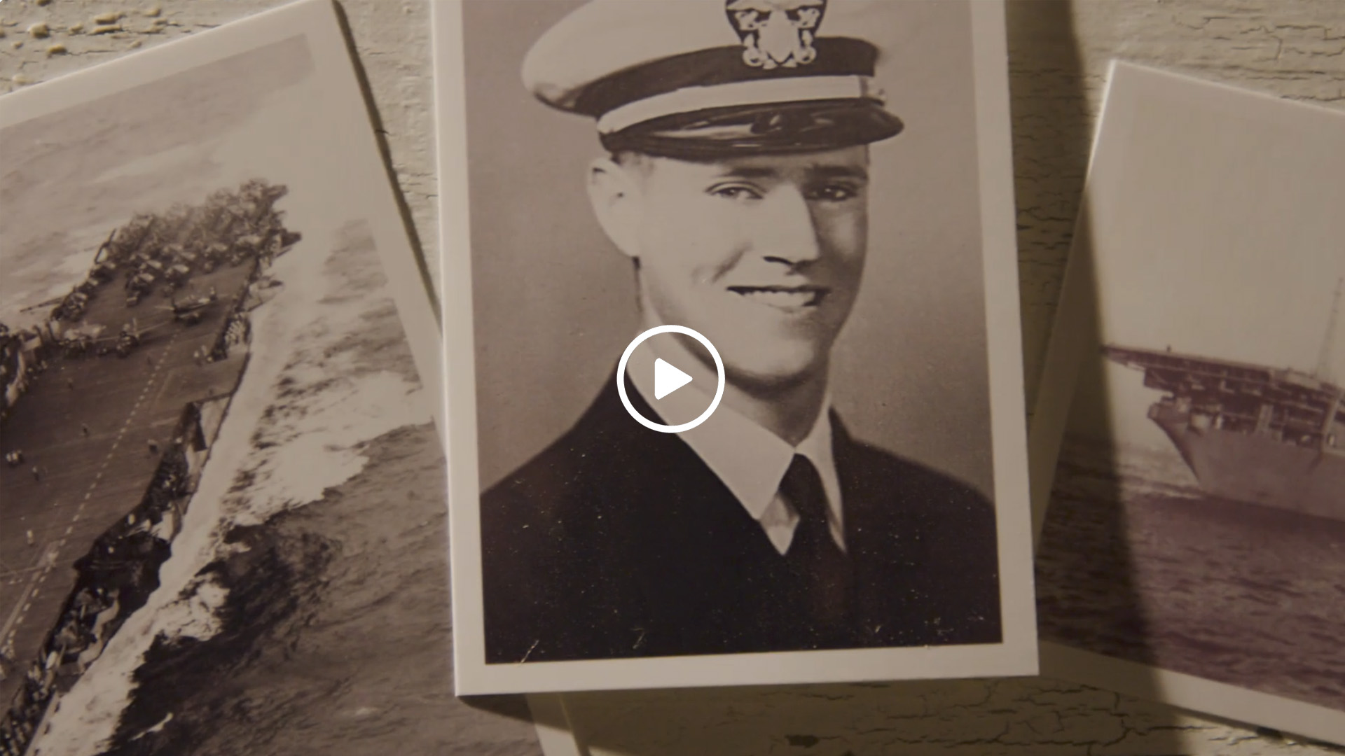 This thumbnail image features a man in military uniform. It links to a video featuring several veterans talking about their service and what they are doing on a construction project.